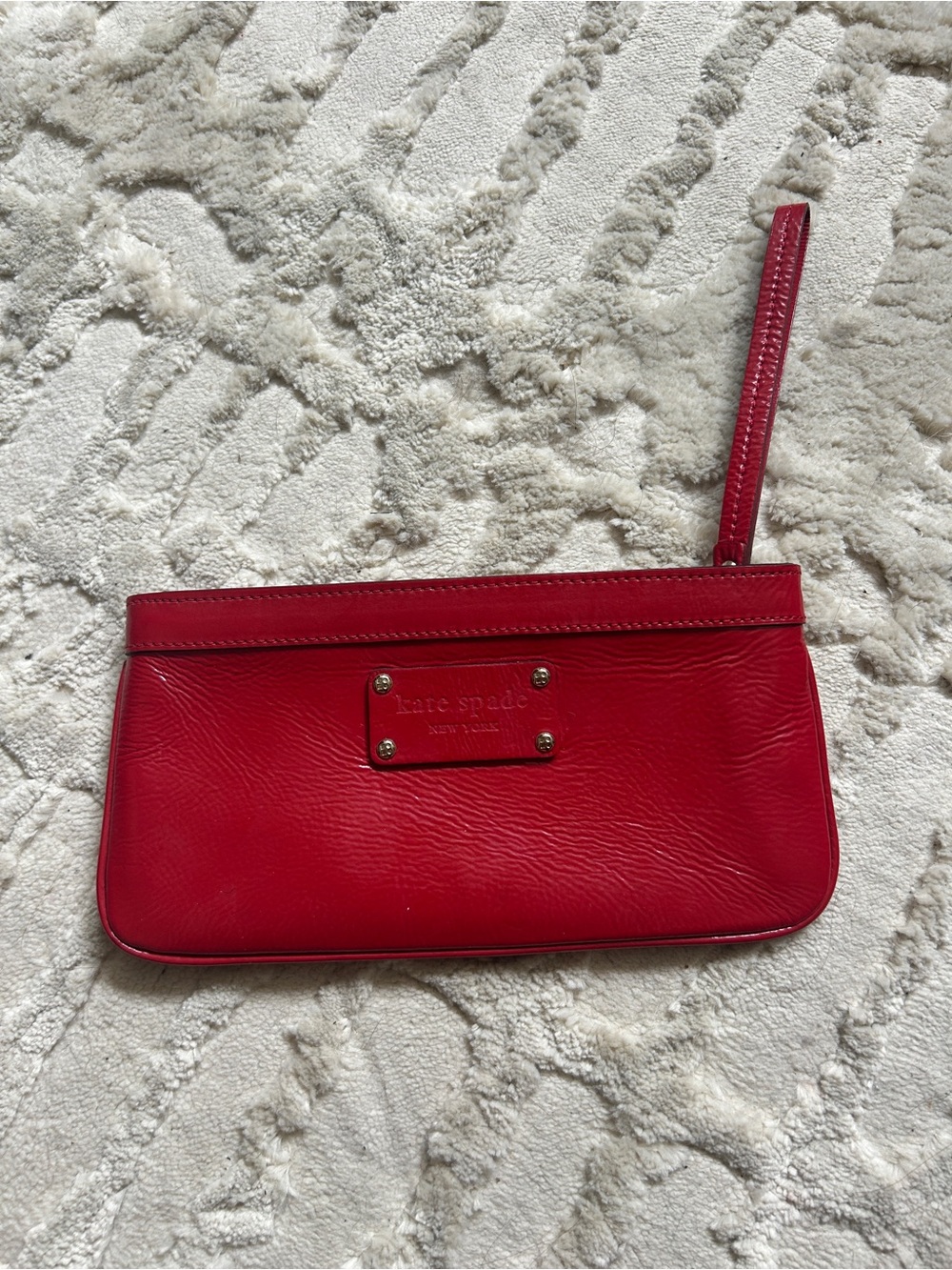 kate spade red patent leather wristlet clutch with logo plaque